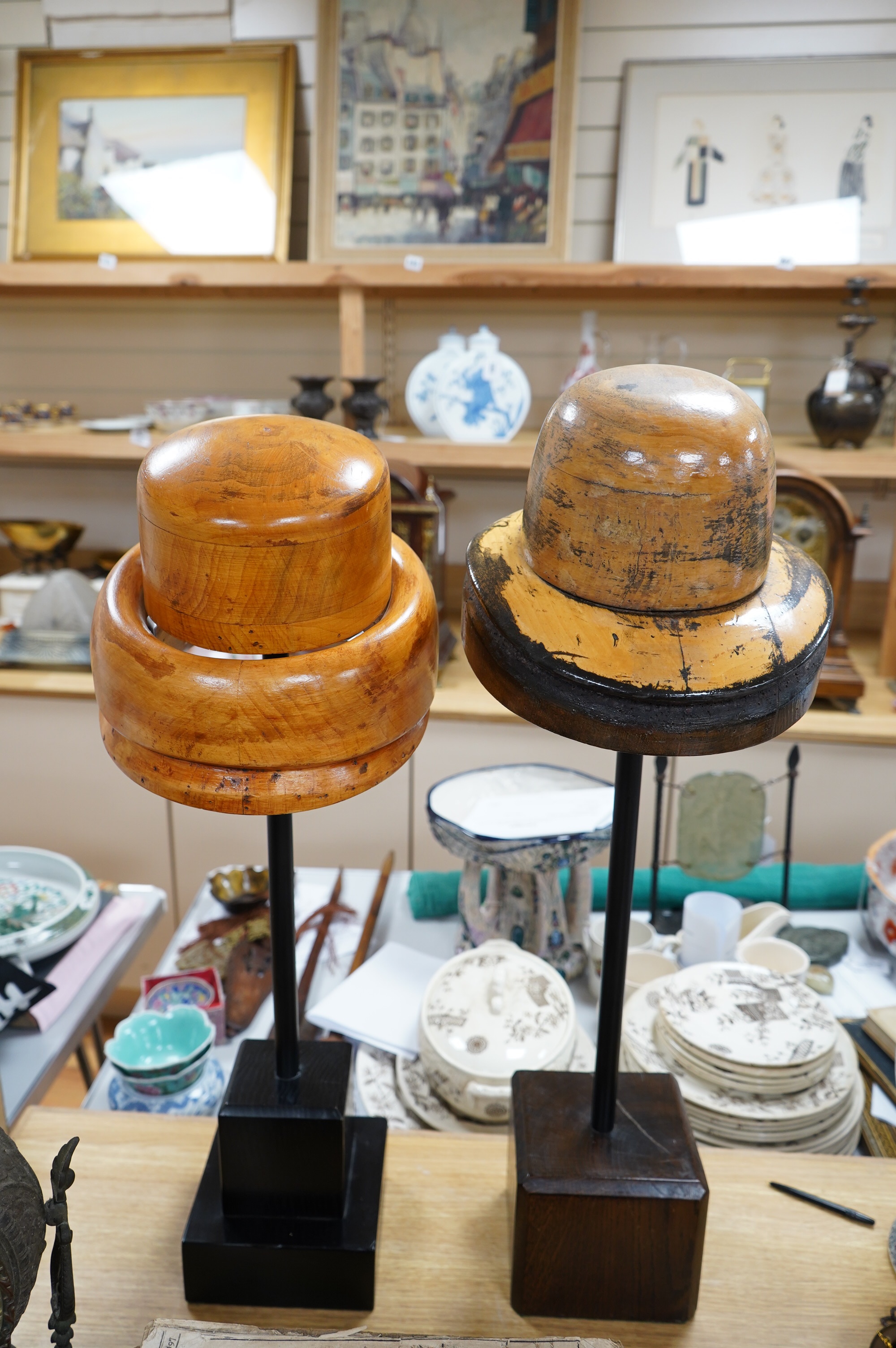 Two vintage milliners wooden hat stands, 72cm high. Condition - fair